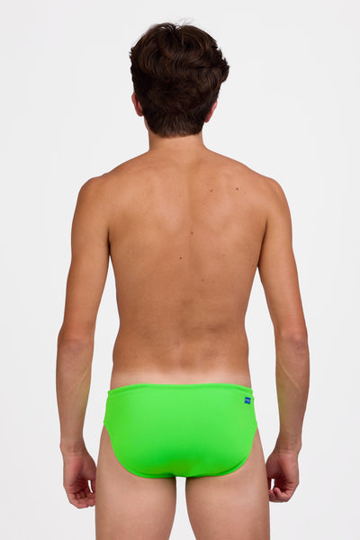 Male model wearing the Men's Brolyn Swim Brief in the Lime solid, standing in front of a grey background shown from the back view

|| Size 32, Hips 39"  