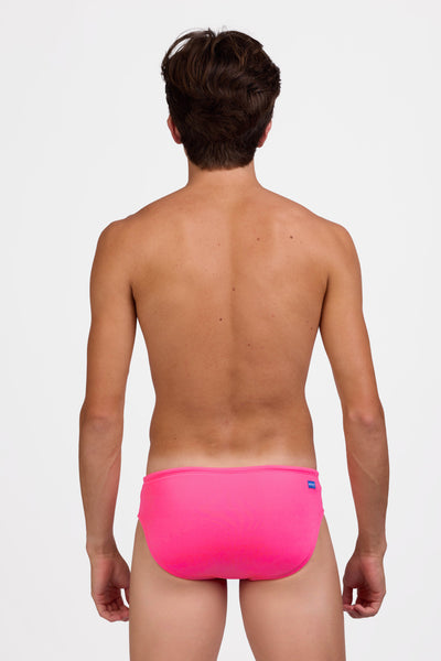 Male model wearing the Men's Brolyn Swim Brief in the Pink Prism solid, standing in front of a grey background shown from the back view

|| Size 32, Hips 39"  