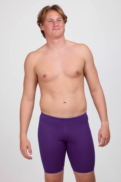 Male model wearing the Mens Brolyn Jammer in the Grape solid standing in front of a grey background, shown from the front view
