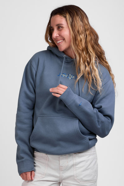 Female model wearing the Raine Hoodie in the Storm Shark Solid, standing in front of a grey background shown from the front view

|| Size S, Bust 36"  