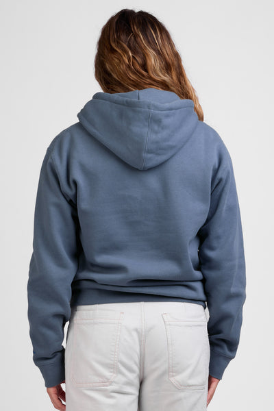 Female model wearing the Raine Hoodie in the Storm Shark Solid, standing in front of a grey background shown from the back view

|| Size S, Bust 36"  