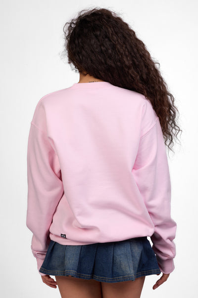 Female model wearing the Women's Roxanne Crewneck in the Bling solid, standing in front of a grey background shown from the back view

|| Size S, Bust 32"