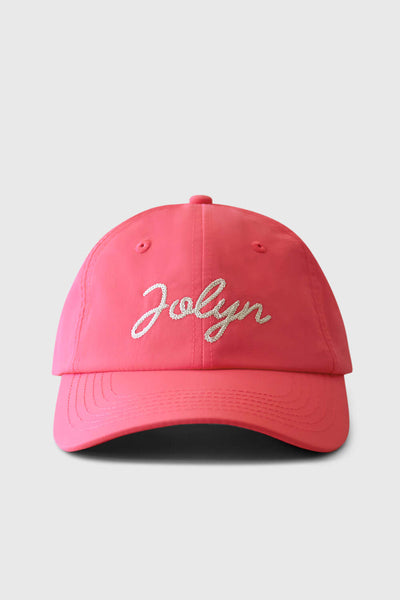 Up close image of the Dad Hat in the Guava Crush Color, shown from the front view