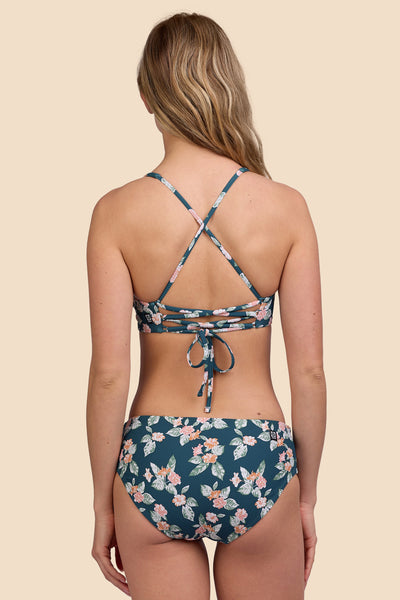 Female model wearing the Womens Dakota Bikini Bottom in the Islander Ribbed print, standing in front of a yellow background shown from the back view

|| Size S, Hip 36"  