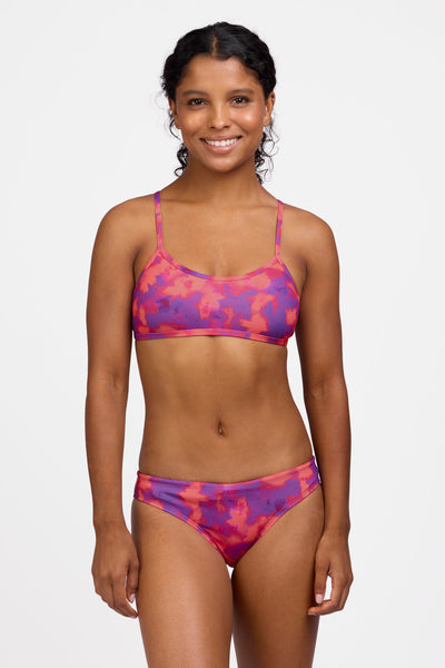 Female model wearing the Women's Andy Bikini Bottom in the Canvas print, standing in front of a grey background shown from the front view

|| Size S, Hip 36.5"  