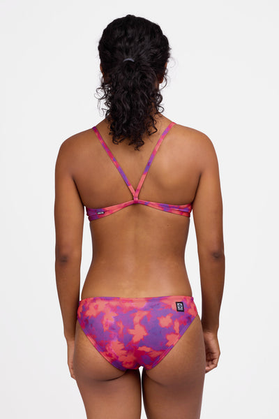 Female model wearing the Women's Andy Bikini Bottom in the Canvas print, standing in front of a grey background shown from the back view

|| Size S, Hip 36.5"  