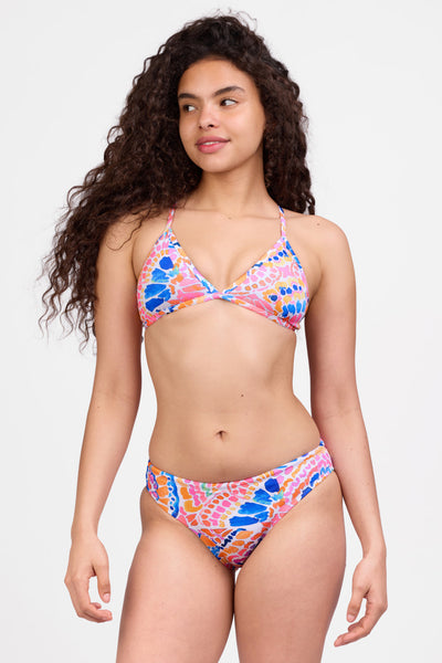 Female model wearing the Women's Andy Bikini Bottom in the Flutterfly print, standing in front of a grey background shown from the front view

|| Size S, Hips 34"
