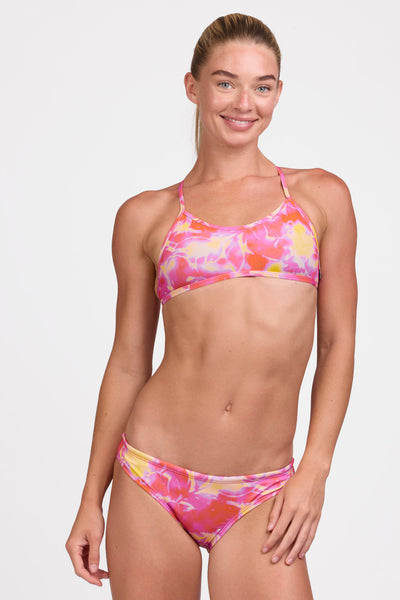 Female model wearing the Women's Andy Bikini Bottom in the Sundae print, standing in front of a grey background shown from the front view

|| Size S, Hip 37"  