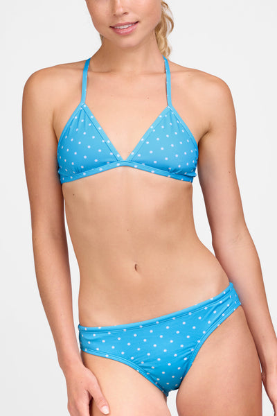 Female model wearing the Women's Andy Bikini Bottom in the Zippy print, standing in front of a grey background shown from the front view 

|| Size S, Hip 35"