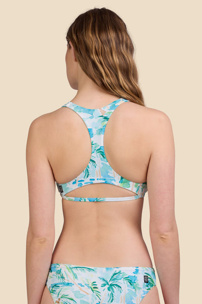 Female model wearing the Women's Doris Bikini Top in the Cocopalm print, standing in front of a yellow background shown from the back view

|| Size S, Bust 30.5"  
