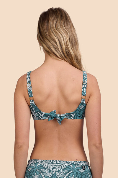 Female model wearing the Women's Kacey Bikini Top in the Shorebreak print, standing in front of a yellow background shown from the back view

|| Size S, Bust 33"  
