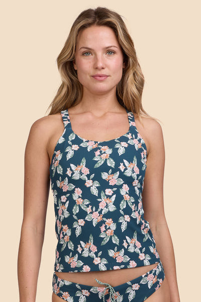 Female model wearing the Women's Paula Tankini Top in the Islander Ribbed print, standing in front of a yellow background, shown from the front view

|| Size S, Bust 33"  