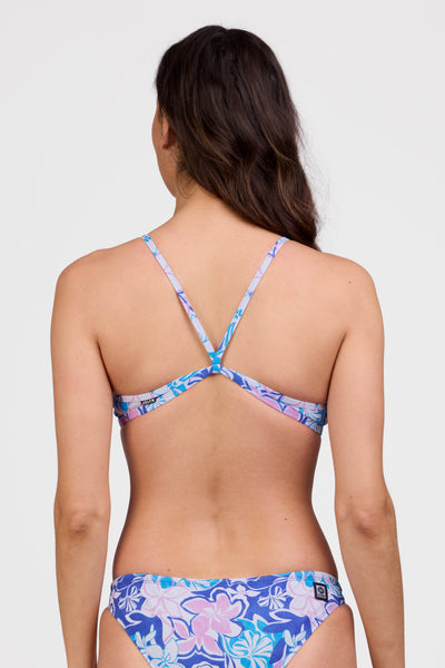 Female model wearing the Women's Jocelyn Bikini Top in the Maui print, standing in front of a grey background shown from the back view

|| Size L, Bust 34"
