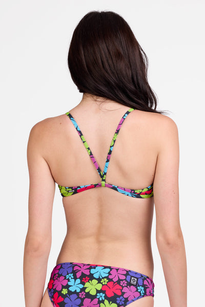 Female model wearing the Women's Jocelyn Bikini Top in the Summernova print, standing in front of a grey background shown from the back view

|| Size S, Bust 31"  