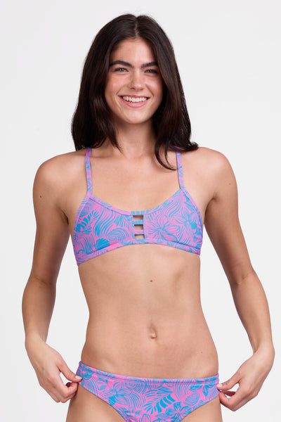Female model wearing the Women's Tomcat Bikini Top in the Cruise print, standing in front of a grey background shown from the front view

|| Size S, Bust 31"