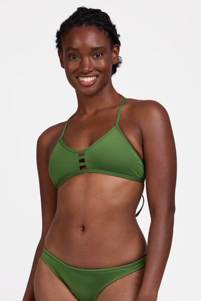Female model wearing the Women's Tomcat Bikini Top in the Mountain Mist solid, standing in front of a grey background, shown from the front view

|| Size M, Bust 34"  