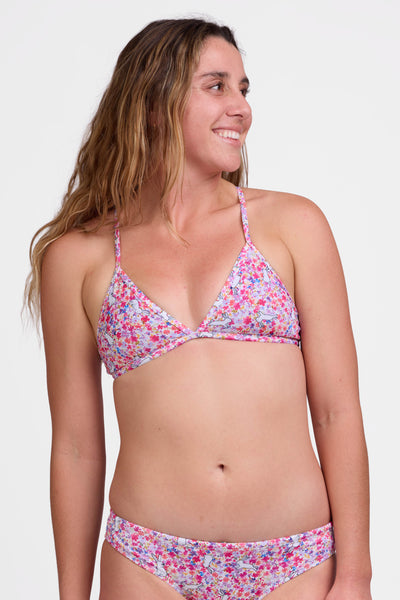 Female model wearing the Women's Triangle Bikini Top in the Hop Hop print, standing in front of a grey background shown from the front view

|| Size M, Bust 36"  