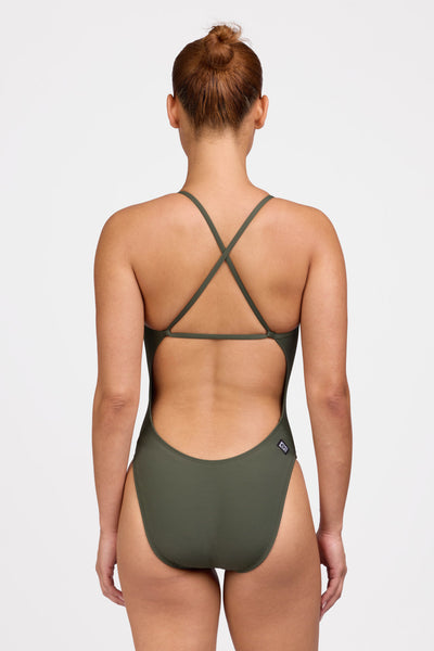 Female model wearing the Women's Brandon One Piece Swimsuit in the Army solid, standing in front of a grey background shown from the back view

|| Size 32, Torso 62.5"  