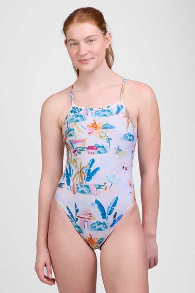 Female model wearing the Women’s Brandon One Piece Swimsuit in the Beach Day print, standing in front of a grey background, shown from front view. 