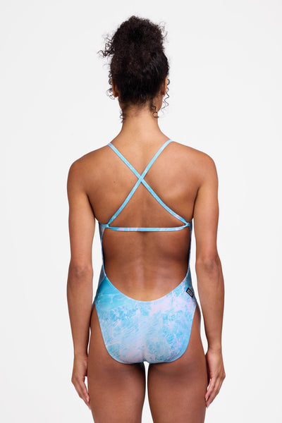 Female model wearing the Women's Brandon One Piece Swimsuit in the Odyssey print, standing in front of a grey background shown from the back view

|| Size 28, Torso 56"  