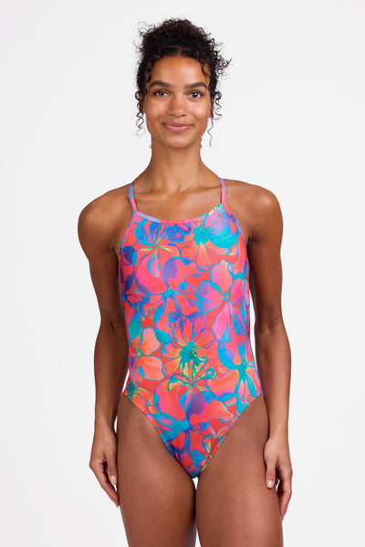 Female model wearing the Women's Brandon One Piece Swimsuit in the Solar Grin print, standing in front of a grey background shown from the front view

|| Size 28, Torso 56"  