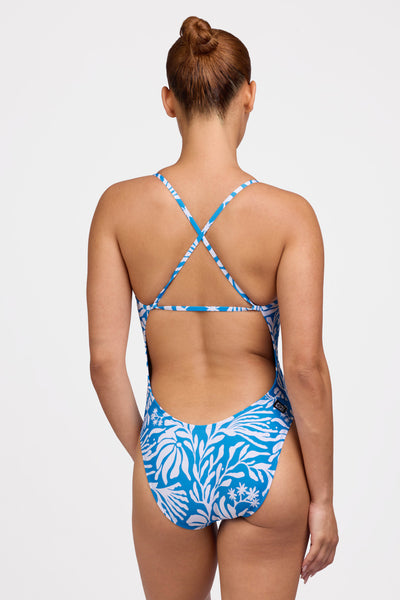 Female model wearing the Women's Brandon One Piece Swimsuit in the Tidepool print, standing in front of a grey background shown from the back view

|| Size 32, Torso 62.5"  
