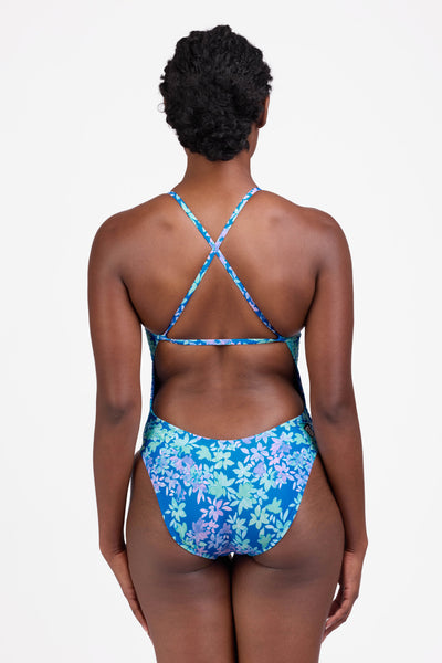 Female model wearing the Women's Brandon One Piece Swimsuit in the Waterlily print, standing in front of a grey background shown from the back view

|| Size 30, Torso 60.5" 