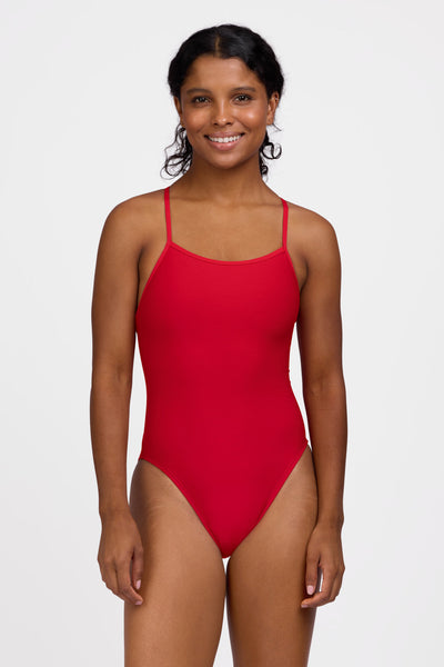 Female model wearing the Women's Drew One Piece Swimsuit in the Red solid, standing in front of a grey background shown from the front view

|| Size 30, Torso 59"