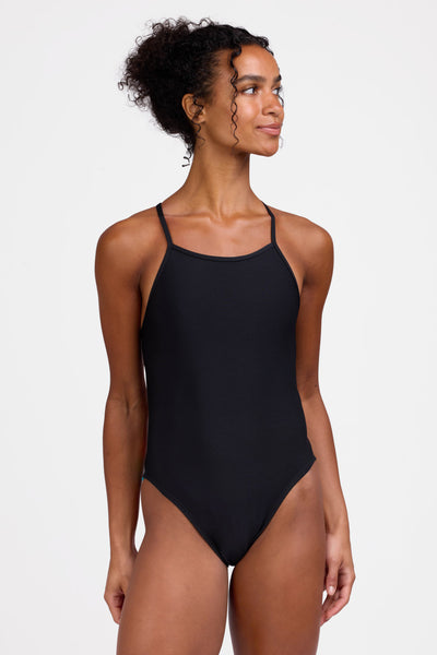 Female model wearing the Women's Gavin  One Piece Swimsuit in the Black contrast, standing in front of a grey background shown from the front view

|| Size 28, Torso 56"  