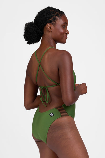 Female model wearing the Women's Gavin One Piece Swimsuit in the Mountain Mist contrast, standing in front of a grey background, shown from the side view

|| Size 30, Torso 60.5" 