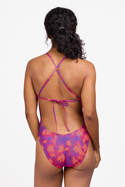 Female model wearing the Women's Jackson One Piece Swimsuit in the Canvas print, standing in front of a grey background shown from the back view

|| Size 30, Torso 59"  