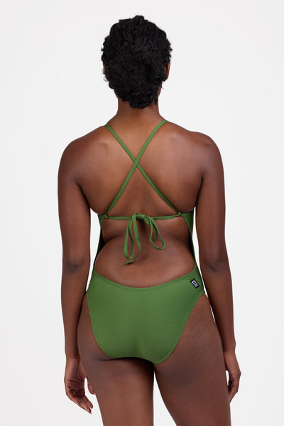 Female model wearing the Women's Jackson One Piece Swimsuit in the Mountain Mist solid, standing in front of a grey background, shown from the back view

|| Size 30, Torso 60.5" 