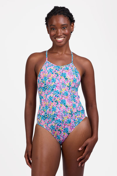 Female model wearing the Women's Marie One Piece Swimsuit in the Cherish print, standing in front of a grey background shown from the front view

|| Size 30, Torso 60.5"  