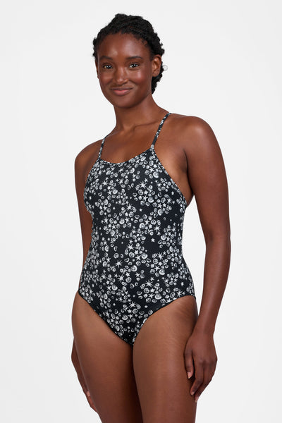 Female model wearing the Women's Marie One Piece Swimsuit in the Shells print, standing in front of a grey background shown from the front view

|| Size 30, Torso 60.5"  