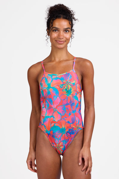 Female model wearing the Women's Michele One Piece Swimsuit in the Solar Grin print, standing in front of a grey background shown from the front view

|| Size 28, Torso 56"  