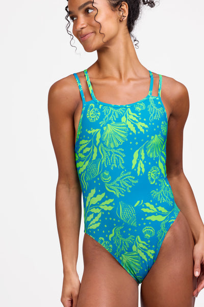 Female model wearing the Women's Murray One Piece Swimsuit in the Undersea print, standing in front of a grey background shown from the front view

|| Size 28, Torso 56"  