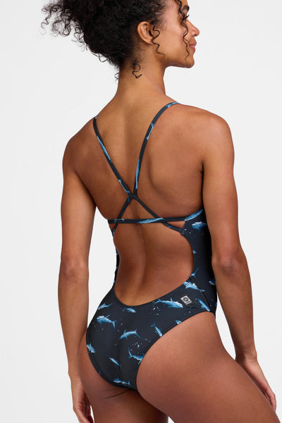 Female model wearing the Women's Perry One Piece Swimsuit in the Shortfin print, standing in front of a grey background shown from the side view

|| Size 28, Torso 56"  