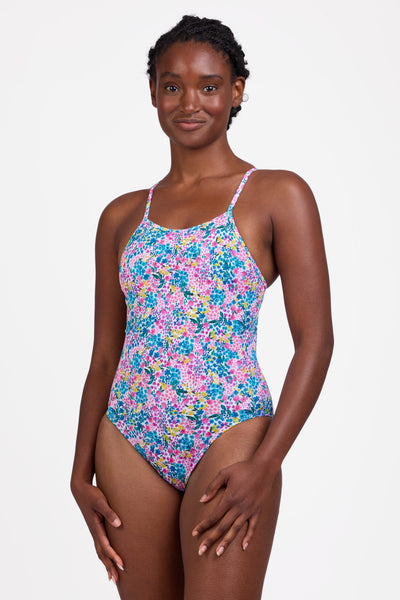 Female model wearing the Women's Tabitha One Piece Swimsuit in the Cherish print, standing in front of a grey background shown from the front view

|| Size 30, Torso 60.5"  