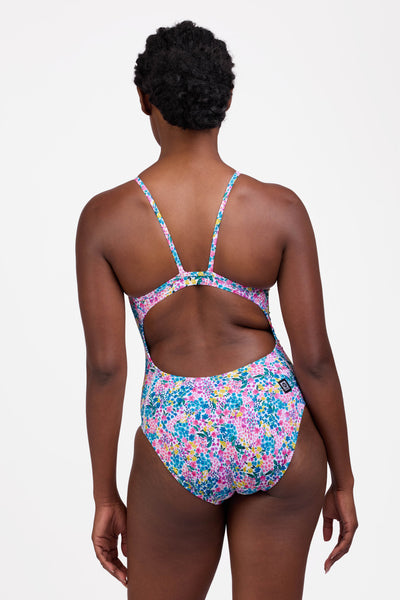 Female model wearing the Women's Tabitha One Piece Swimsuit in the Cherish print, standing in front of a grey background shown from the back view

|| Size 30, Torso 60.5"  