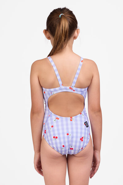 Youth girl model wearing the Tabitha One Piece Swimsuit in the Cherryade print, standing in front of a grey background shown from the back view

|| Size 20, Torso 42.5" 